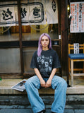 DAXUEN dark grey acid-wash graphic tee with punk portraits — model photo