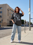 DAXUEN dark grey acid-wash graphic tee with punk portraits — model photo
