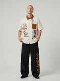 DAXUEN Short-sleeve button-up shirt with dog embroidery — model photo