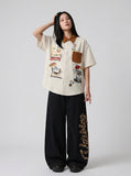 DAXUEN Short-sleeve button-up shirt with dog embroidery — model photo