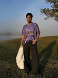 DAXUEN Purple short-sleeved crew neck graphic t-shirt — model photo