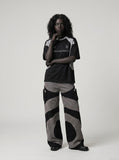 DAXUEN Short-sleeved raglan sports top with graphics — model photo