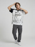 DAXUEN Raglan short-sleeved T-shirt with vertical stripes and graphics — model photo