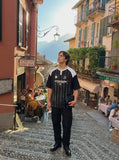 DAXUEN Raglan short-sleeved T-shirt with vertical stripes and graphics — model photo