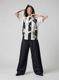 DAXUEN dark indigo raw denim wide-leg jeans with drawstring detail — model photo