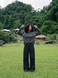 DAXUEN dark indigo raw denim wide-leg jeans with drawstring detail — model photo