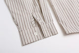 DAXUEN cream long-sleeve shirt with red circular embroidery