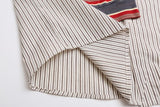 DAXUEN cream long-sleeve shirt with red circular embroidery