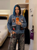 DAXUEN washed black distressed red-embroidered wide-leg jeans — model photo