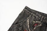 DAXUEN washed black distressed flame-embroidered wide-leg jeans