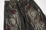 DAXUEN washed black distressed flame-embroidered wide-leg jeans