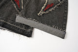 DAXUEN washed black distressed flame-embroidered wide-leg jeans
