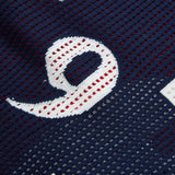DAXUEN red oversized mesh polo with navy cross graphic