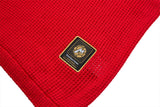 DAXUEN red oversized mesh polo with navy cross graphic