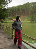 DAXUEN black balloon leg striped casual pants — model photo