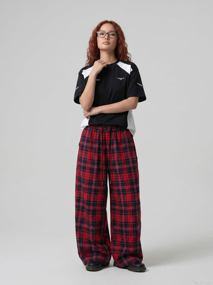 DAXUEN black balloon leg striped casual pants — model photo