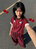 DAXUEN black balloon leg striped casual pants — model photo
