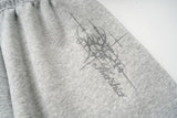 DAXUEN light grey marl wide-leg sweatpants with reflective wing graphic