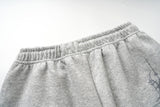 DAXUEN light grey marl wide-leg sweatpants with reflective wing graphic