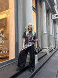 DAXUEN Washed black graphic t-shirt with band print — model photo