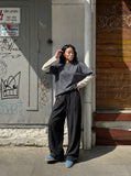 DAXUEN black relaxed wide-leg linen trousers — model photo