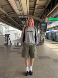 DAXUEN Relaxed-fit cargo shorts in solid colors — model photo