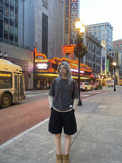 DAXUEN Relaxed-fit cargo shorts in solid colors — model photo