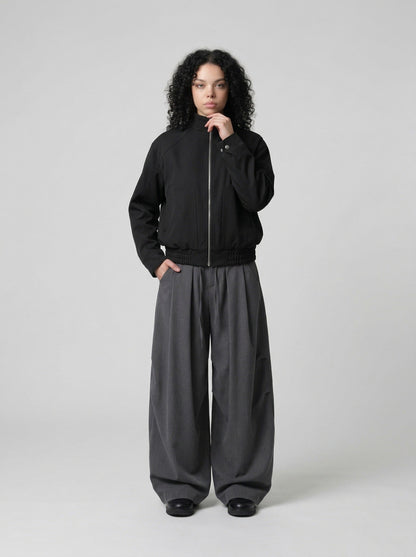 DAXUEN Unisex relaxed fit bomber jacket with pockets — model photo