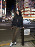 DAXUEN Unisex relaxed fit bomber jacket with pockets — model photo