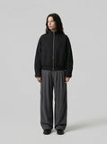 DAXUEN Unisex relaxed fit bomber jacket with pockets — model photo