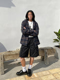 DAXUEN Relaxed fit cargo shorts in solid colours — model photo