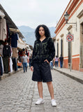 DAXUEN Men's relaxed-fit dark blue denim shorts — model photo