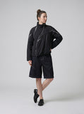 DAXUEN Men's relaxed-fit dark blue denim shorts — model photo