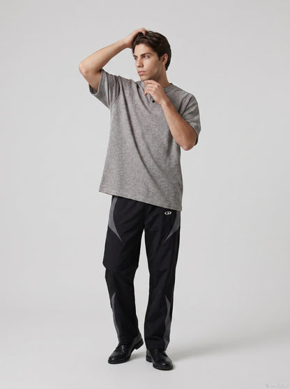 DAXUEN Men's relaxed-fit short-sleeved knit top — model photo