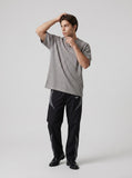 DAXUEN Men's relaxed-fit short-sleeved knit top — model photo