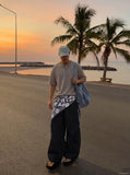DAXUEN Men's relaxed-fit short-sleeved knit top — model photo