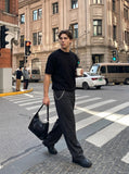 DAXUEN khaki relaxed-fit knit top — model photo