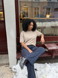 DAXUEN khaki relaxed-fit knit top — model photo