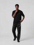DAXUEN Relaxed fit short-sleeve crew neck T-shirt with embroidered emblem — model photo