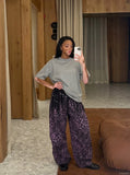 DAXUEN Relaxed fit short-sleeved top in grey and black — model photo