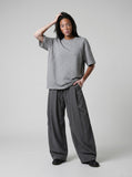 DAXUEN Relaxed fit short-sleeved top in grey and black — model photo