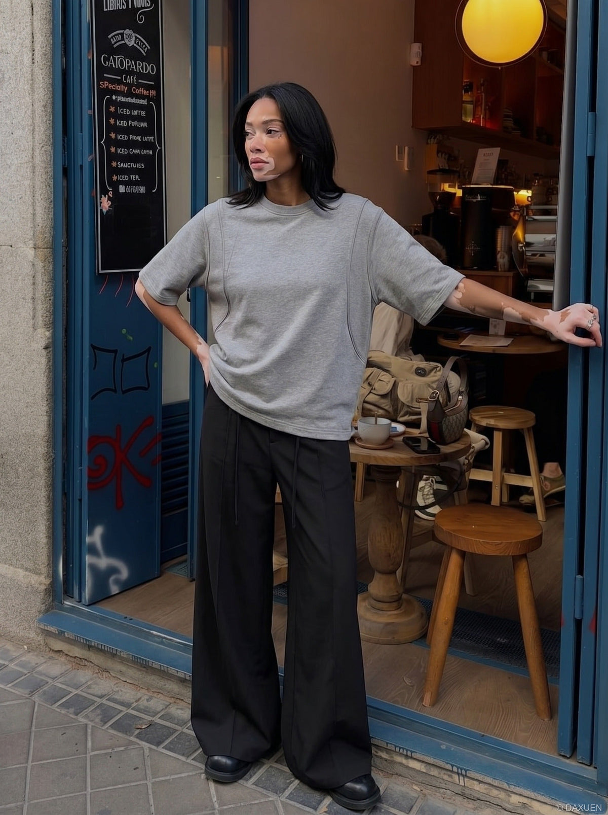 DAXUEN Relaxed fit short-sleeved top in grey and black — model photo
