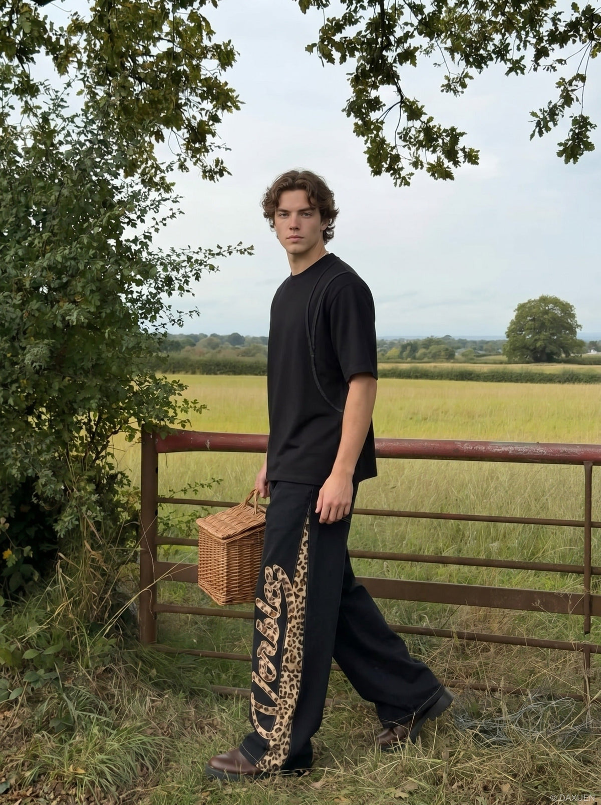 DAXUEN Relaxed fit short-sleeved top in grey and black — model photo