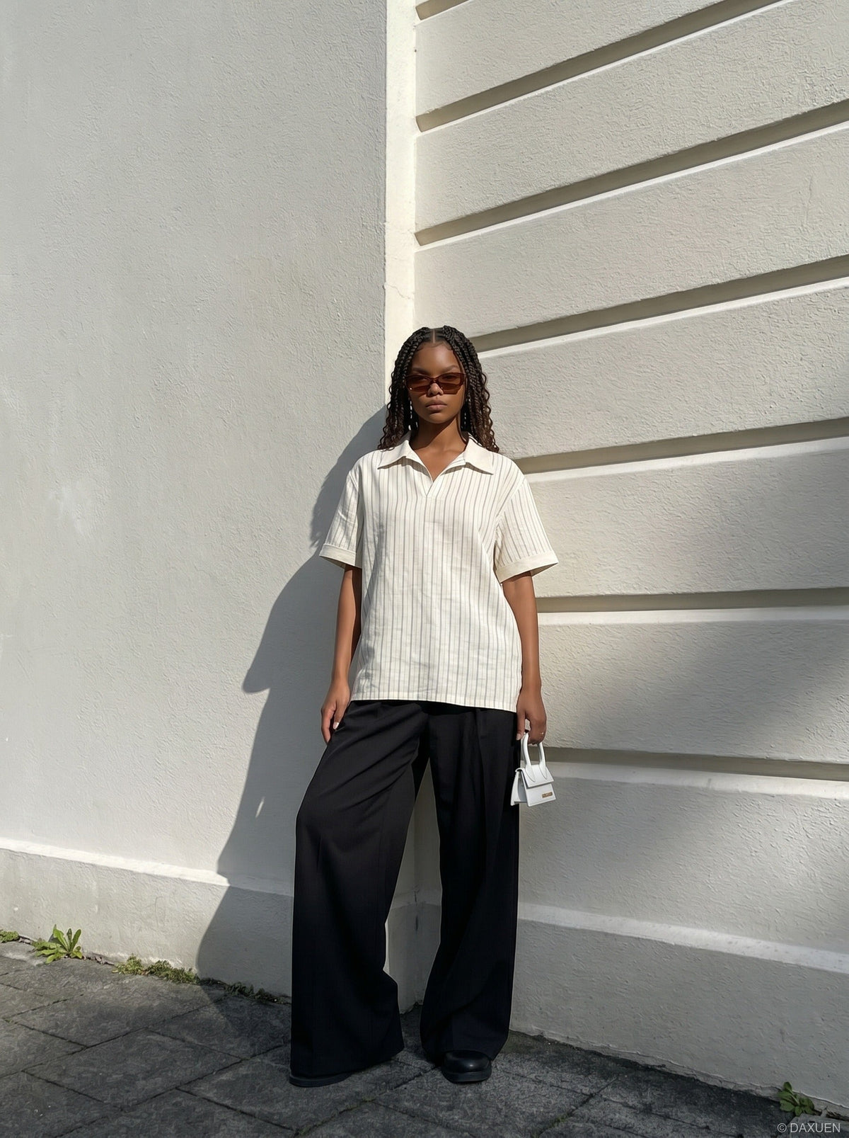 DAXUEN Relaxed-fit short-sleeved polo shirt with stripes — model photo