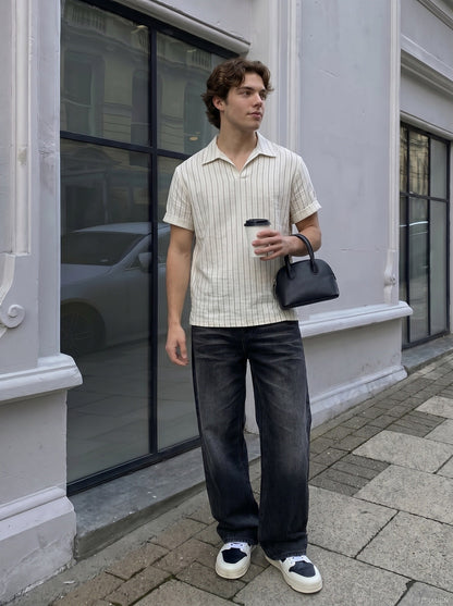 DAXUEN Relaxed-fit short-sleeved polo shirt with stripes — model photo