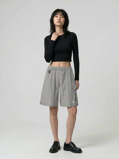 DAXUEN Relaxed fit shorts with crinkled texture and logo — model photo