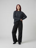 DAXUEN Oversized long-sleeved mock neck top — model photo