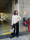 DAXUEN Oversized long-sleeved mock neck top — model photo