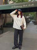 DAXUEN Oversized long-sleeved mock neck top — model photo