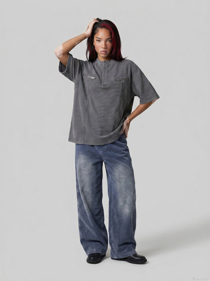 DAXUEN Relaxed oversized short-sleeve top with zippered pockets — model photo